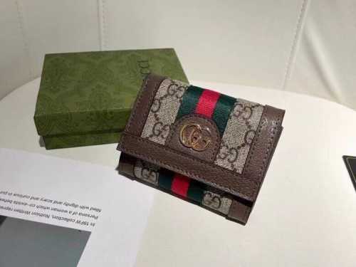 Guccl 8746颜色 啡色尺寸：11*9*3 Gucci 专柜最新款出货！采用里外头层小牛皮 ，做工精致，超多卡位，超薄款设计，携带方便！