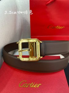 特 卡地亚针扣式皮带，Cartier标志。黑色与棕色牛皮双面皮带，浮雕“Cartier”标志。尺寸：宽35毫米 可调节