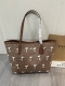 Coach 蔻驰新款 5月新品Cbj89 新款 史努比City Tote 最卡哇伊老花托特 吸扣设计 自重感极轻 都是经典颜色搭配 工艺细致，真皮包边 耐用度大