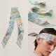 爱马仕 Hermes｜水上游乐园 Twilly小丝巾 束发带，产品描述：Twilly小丝巾 100%桑蚕丝 。 这款小巧的真丝配饰佩戴方式千变万化，可为您的日常