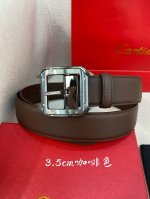 特 卡地亚针扣式皮带，Cartier标志。黑色与棕色牛皮双面皮带，浮雕“Cartier”标志。尺寸：宽35毫米 可调节